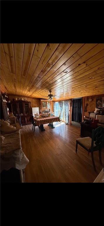 playroom featuring wooden ceiling, wood finished floors, and ceiling fan