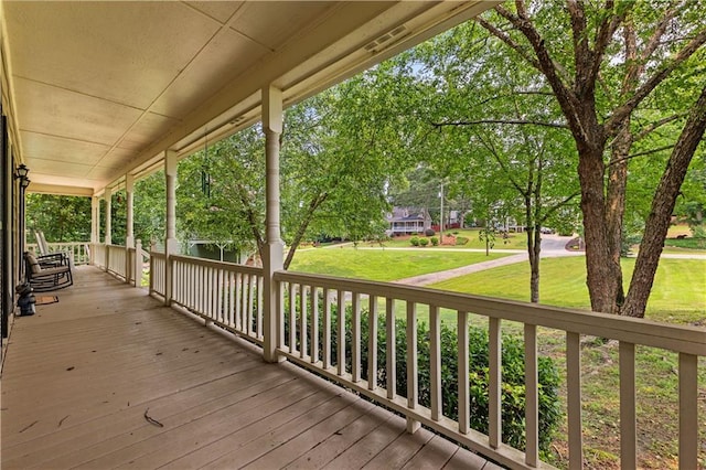 59 Cedar Way, Dallas, GA 30132 - wooden porch with a lawn