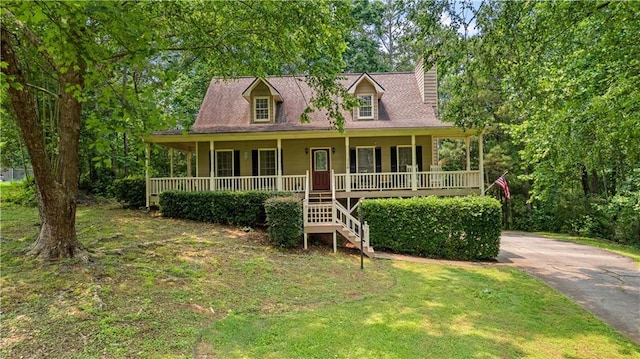 59 Cedar Way, Dallas, GA 30132 - view of front facade featuring a porch, stairway, a front lawn, and driveway