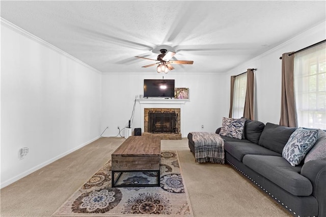 59 Cedar Way, Dallas, GA 30132 - living room with carpet flooring, a fireplace, a ceiling fan, ornamental molding, and baseboards