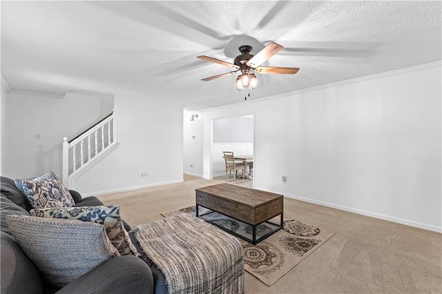 59 Cedar Way, Dallas, GA 30132 - carpeted living area with a ceiling fan, stairway, ornamental molding, and baseboards