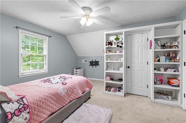 59 Cedar Way, Dallas, GA 30132 - carpeted bedroom with lofted ceiling, ceiling fan, and a textured ceiling