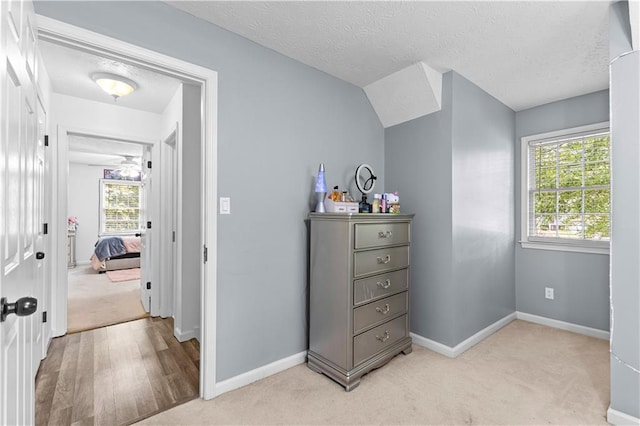 59 Cedar Way, Dallas, GA 30132 - bedroom with light colored carpet, baseboards, and a textured ceiling