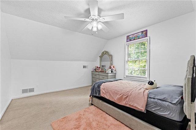 59 Cedar Way, Dallas, GA 30132 - carpeted bedroom with baseboards, vaulted ceiling, a textured ceiling, and a ceiling fan