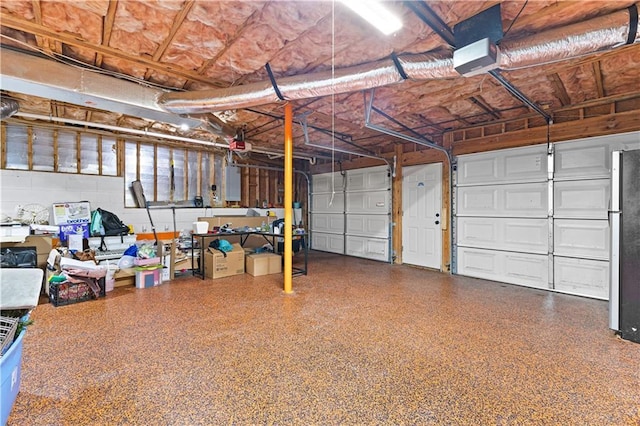 59 Cedar Way, Dallas, GA 30132 - garage featuring electric panel and a garage door opener