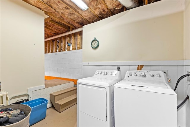 59 Cedar Way, Dallas, GA 30132 - laundry room featuring washer and dryer and concrete block wall