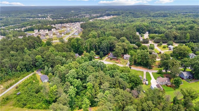 59 Cedar Way, Dallas, GA 30132 - aerial view of property and surrounding area featuring a heavily wooded area
