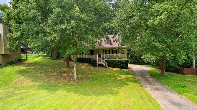 59 Cedar Way, Dallas, GA 30132 - view of front facade featuring covered porch and stairs