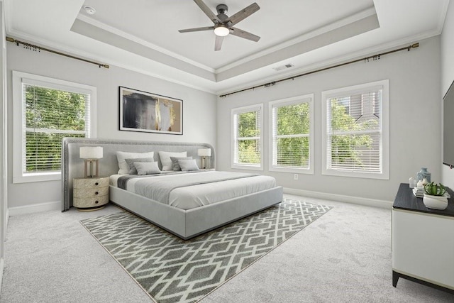 2093 Callaway Ct NW, Atlanta, GA 30318 - carpeted bedroom featuring ornamental molding, a raised ceiling, multiple windows, baseboards, and ceiling fan