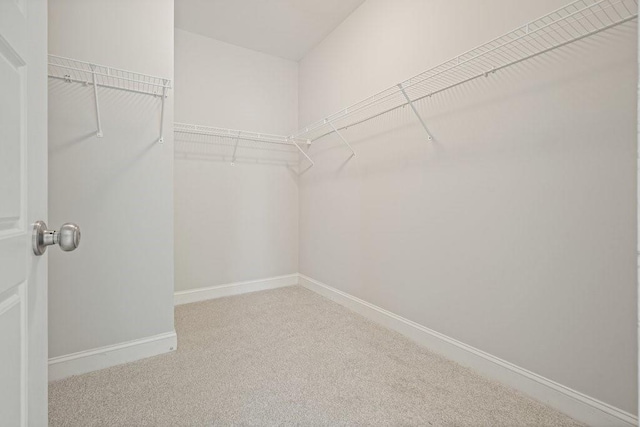 2093 Callaway Ct NW, Atlanta, GA 30318 - spacious closet featuring carpet flooring