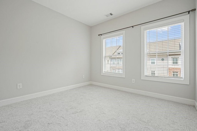 2093 Callaway Ct NW, Atlanta, GA 30318 - carpeted spare room featuring baseboards