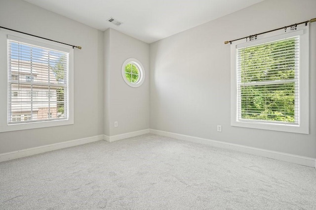 2093 Callaway Ct NW, Atlanta, GA 30318 - carpeted empty room with baseboards