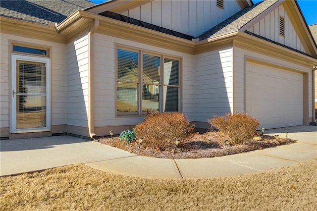view of side of property featuring a garage