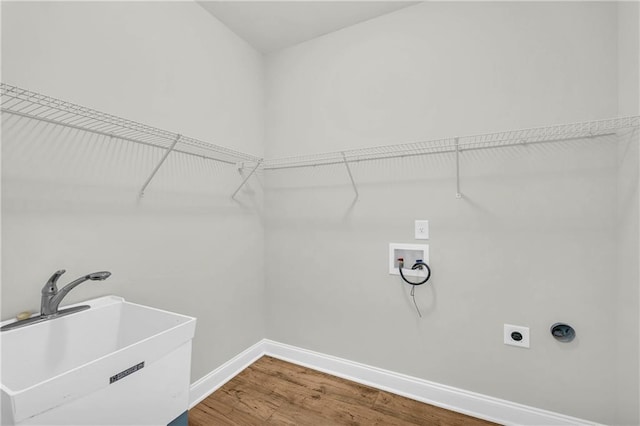 151 Chestnut Chase, Hoschton, GA 30548 - washroom with washer hookup, electric dryer hookup, baseboards, and wood finished floors