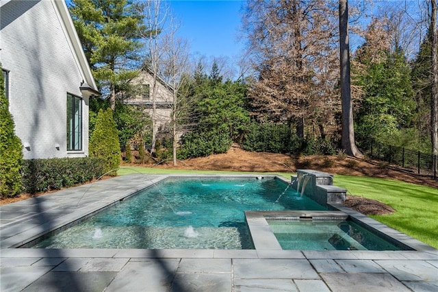 view of pool with a fenced in pool, a yard, and an in ground hot tub