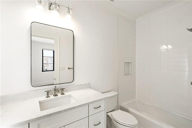 bathroom featuring vanity, toilet, and shower / bathtub combination