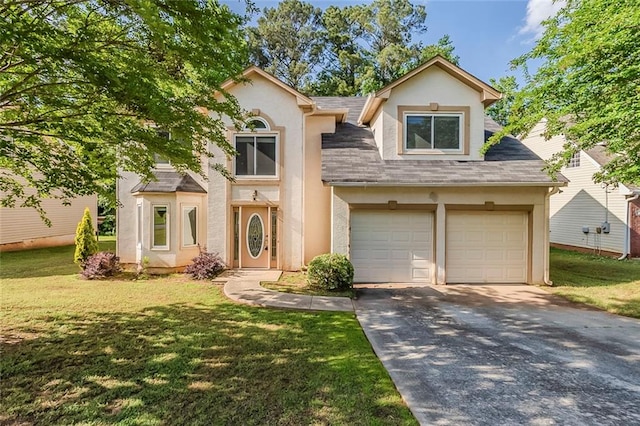 view of front of property featuring a garage, stucco siding, a front yard, and concrete driveway
