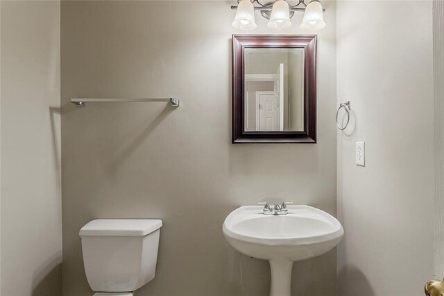 bathroom featuring a sink and toilet