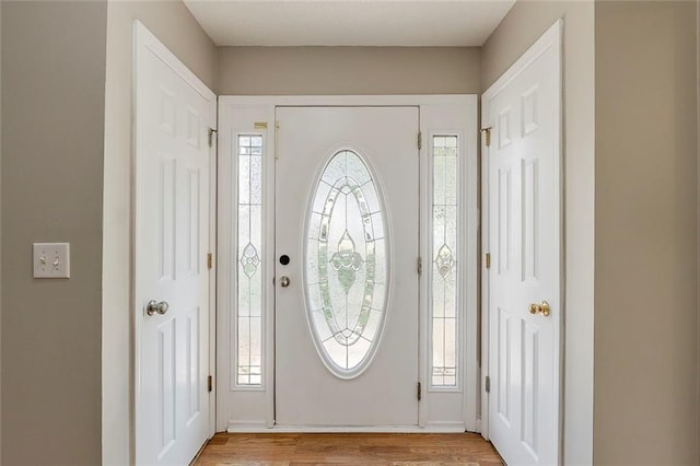foyer with light wood finished floors