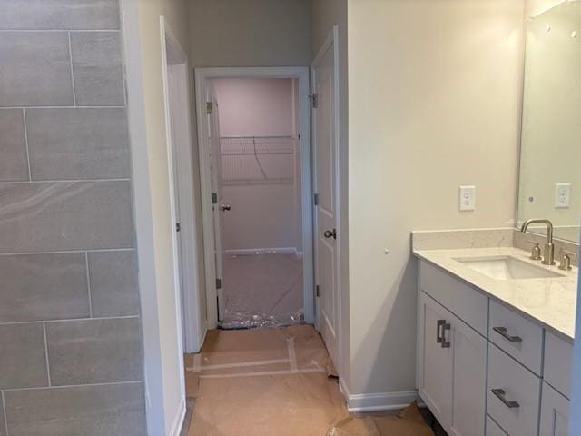385 Riverwood Pass, Dallas, GA 30157 - bathroom featuring vanity and a spacious closet