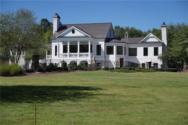 385 Riverwood Pass, Dallas, GA 30157 - view of front of home featuring a chimney, a metal roof, and a standing seam roof