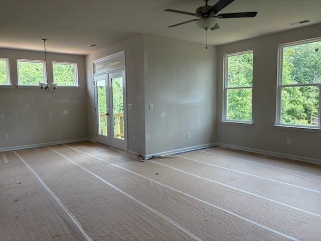 385 Riverwood Pass, Dallas, GA 30157 - unfurnished room featuring a chandelier and a ceiling fan