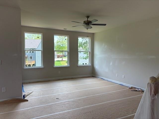 385 Riverwood Pass, Dallas, GA 30157 - unfurnished room with plenty of natural light and a ceiling fan