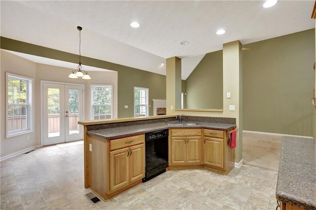 kitchen featuring french doors, dishwasher, pendant lighting, and plenty of natural light