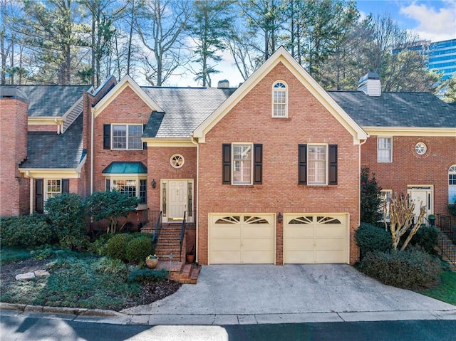 view of front of home with a garage