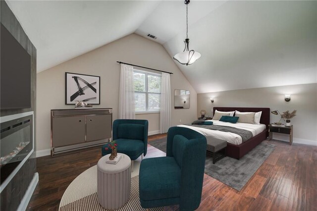 bedroom with dark wood-type flooring and vaulted ceiling