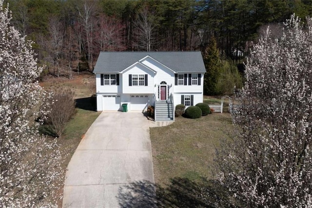 view of front facade with an attached garage and driveway