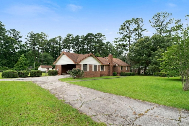101 Beaver Run, Lagrange, GA 30241 - single story home with brick siding, asphalt driveway, a front yard, a chimney, and a garage