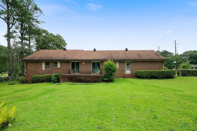 101 Beaver Run, Lagrange, GA 30241 - back of property featuring a lawn and brick siding