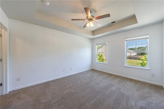 8475 Douglass Trl, Jonesboro, GA 30236 - unfurnished room with visible vents, baseboards, and a raised ceiling