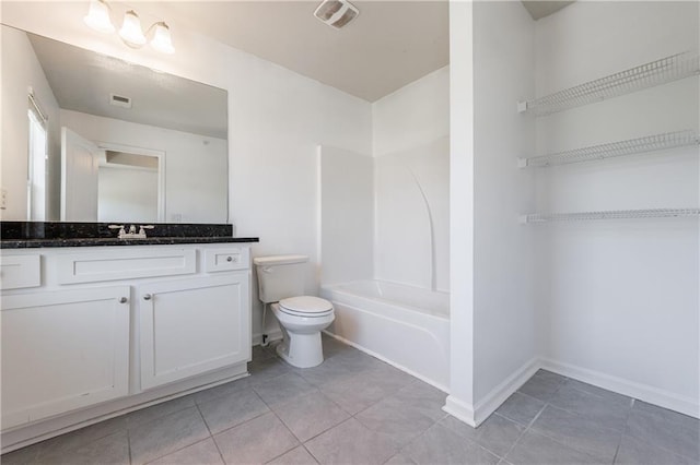 8475 Douglass Trl, Jonesboro, GA 30236 - bathroom with tile patterned floors, vanity, visible vents, and toilet