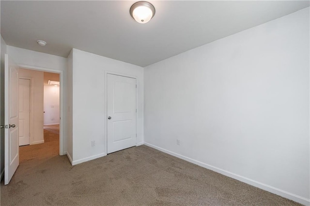 8475 Douglass Trl, Jonesboro, GA 30236 - unfurnished bedroom featuring carpet flooring and baseboards