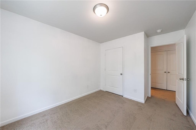8475 Douglass Trl, Jonesboro, GA 30236 - unfurnished bedroom with carpet flooring and baseboards