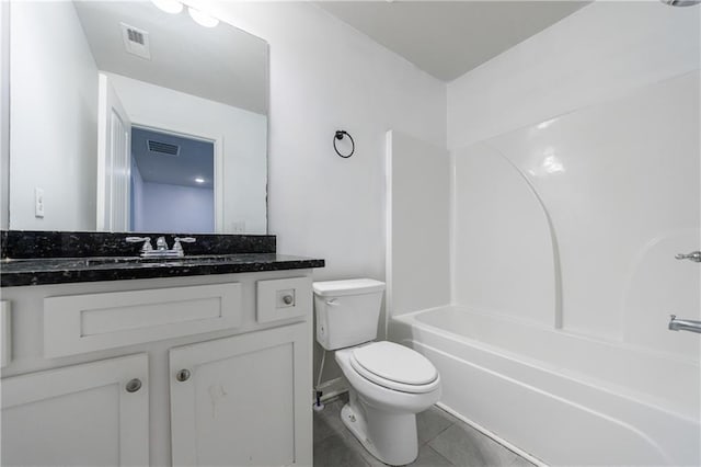 8475 Douglass Trl, Jonesboro, GA 30236 - full bathroom featuring vanity, tile patterned flooring, toilet, shower / bathtub combination, and visible vents