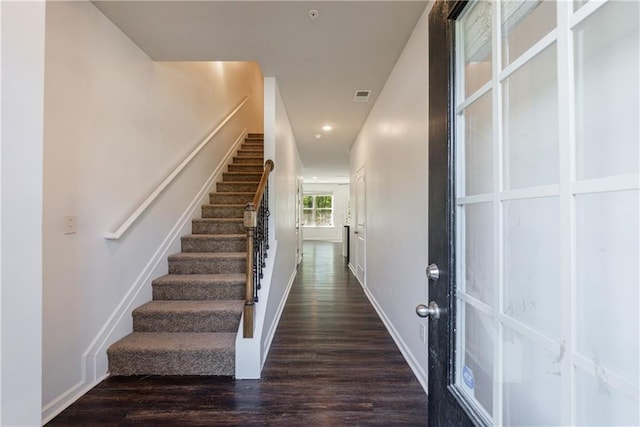 8475 Douglass Trl, Jonesboro, GA 30236 - staircase with wood finished floors, baseboards, visible vents, and recessed lighting