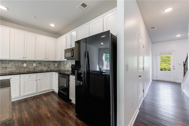 8475 Douglass Trl, Jonesboro, GA 30236 - kitchen with white cabinetry, visible vents, black appliances, and dark wood-style floors