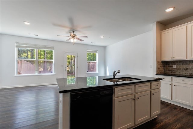 8475 Douglass Trl, Jonesboro, GA 30236 - kitchen featuring black dishwasher, a sink, dark wood-style flooring, ceiling fan, and a wealth of natural light