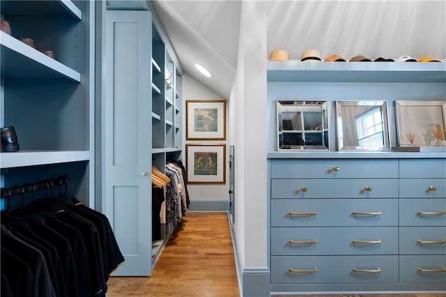 walk in closet featuring light wood-style flooring