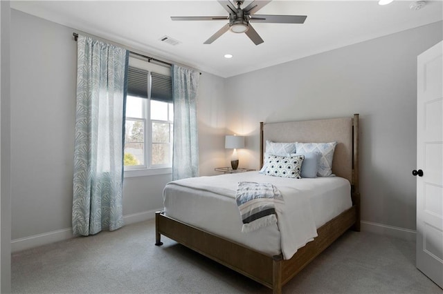 bedroom featuring visible vents, carpet flooring, a ceiling fan, and baseboards