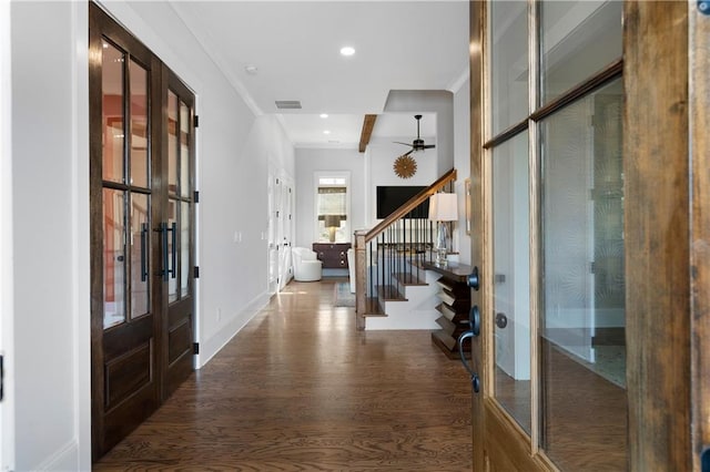 entrance foyer featuring french doors, visible vents, wood finished floors, and stairway