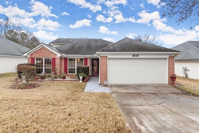 ranch-style home featuring a garage and a front yard