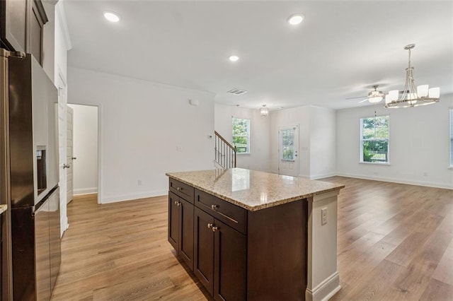 6761 Cedar Glen Rd, Peachtree Corners, GA 30360 - kitchen featuring stainless steel refrigerator with ice dispenser, dark brown cabinetry, light wood-style floors, plenty of natural light, and recessed lighting