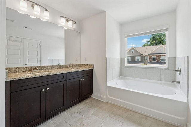6761 Cedar Glen Rd, Peachtree Corners, GA 30360 - bathroom with double vanity, a bath, and tile patterned floors