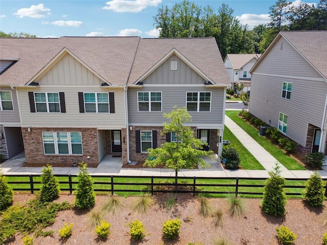 6761 Cedar Glen Rd, Peachtree Corners, GA 30360 - view of front of house with board and batten siding and brick siding