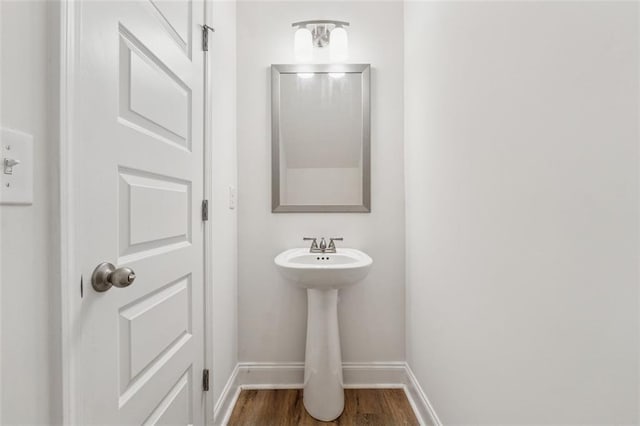 6761 Cedar Glen Rd, Peachtree Corners, GA 30360 - bathroom with wood finished floors and baseboards