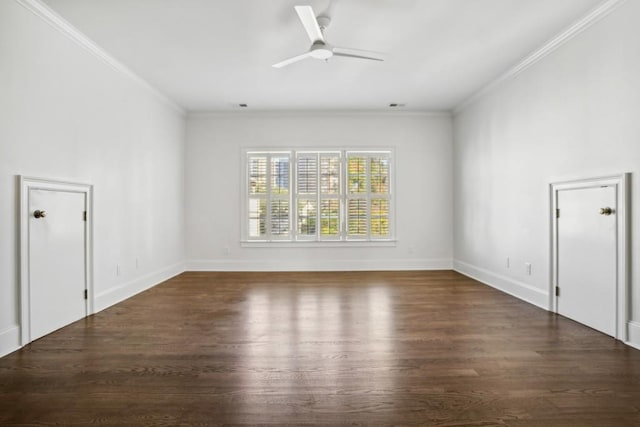 empty room with ornamental molding, dark hardwood / wood-style floors, and ceiling fan